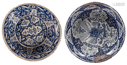 Two impressive bowls in blue and white glazed earthenware, the Middle East (Iran), possibly 18thC, restorations, H 16 - 19,5 - ø 54 - 60 cm