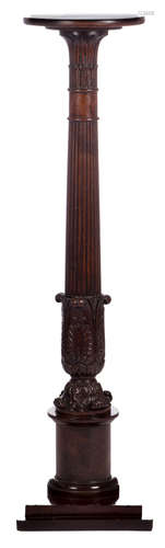 A Neoclassical mahogany and mahogany veneered soccle, late 19thC, H 120 cm