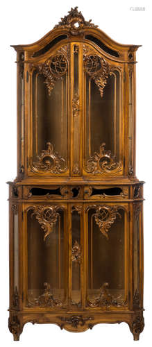 A fine carved walnut display cabinet in Rococo style in the Liégeois manner, H 198 - W 89 cm