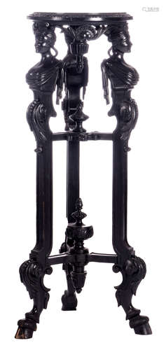 A late 19thC ebonised wood goat hoof stand, the top worn by cariatides, H 116 cm