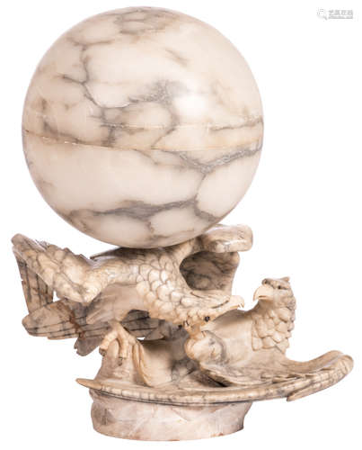 An alabaster and marble lamp depicting a globe carried by two fighting eagles, Art Deco period, H 80 cm