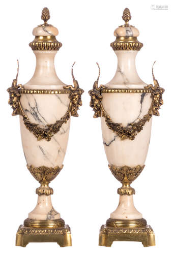 A pair of Neoclassical marble cassolettes with bronze mounts, H 57 cm