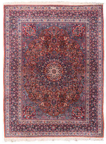 An Oriental rug with central medaillon and floral motifs, Mashad, wool on cotton, marked, 252 x 335 cm