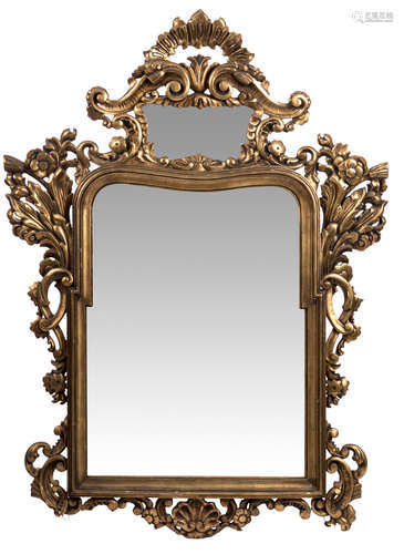 An early Rococo style wall mirror in cut and gilt wood, H 132 - W 96 cm