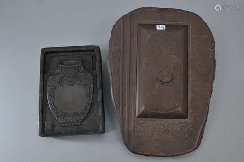 2 ink stones, China 19th-early 20th century. One carved with a vase, the other as a natural slab carved with flowering prunus. 5-1/2