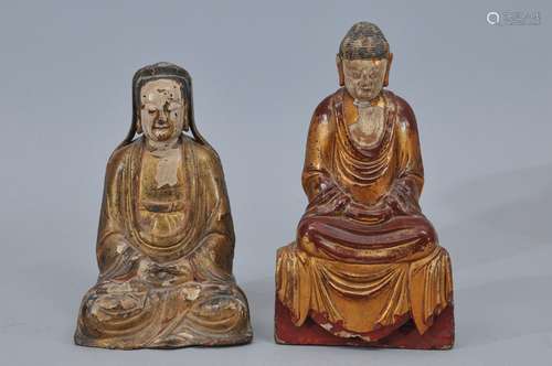 Two carved wooden figures of the Buddha. 18th century or earlier. One step type. Traces of gilding remaining. Each about 8