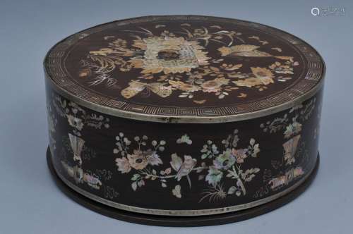 Round covered box. Vietnam. 19th century. Hardwood with mother of pearl inlay of birds, butterflies and flowers (loss to inlay). 12-1/2