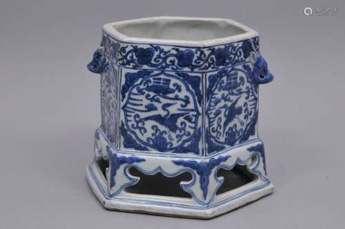 Porcelain incense burner. China. 19th century. Hexagonal form. Ming style underglaze blue decoration of cranes and trigrams. Ju-i borders. Rue handles. 7-1/2