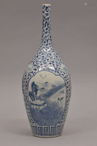 Porcelain vase, Japan 19th century. Bottle form, under glaze blue decoration of figures in landscapes on a floral scroll ground. 14-1/2