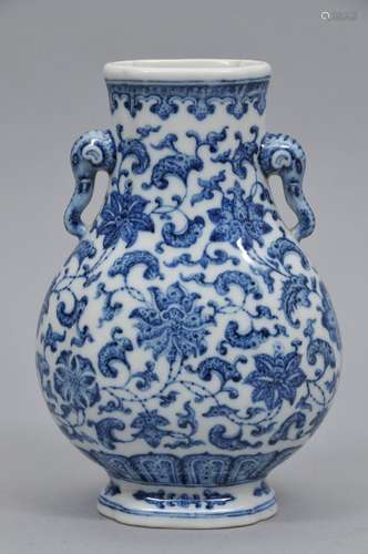 Porcelain vase. China. 20th century. Quatrefoil flattened pear form with elephant handles. 