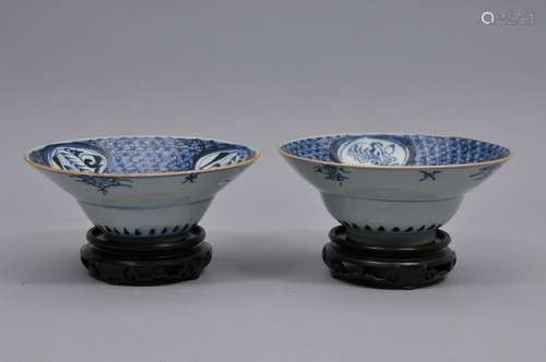 Pair of porcelain bowls. China. Underglaze blue decoration of floral reserves on a brocade ground. 7-1/4