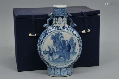Porcelain vase. China. 19th century. Pilgrim flask form. Underglaze blue decoration of reserves of scholars on a lotus scroll ground. 8-1/2