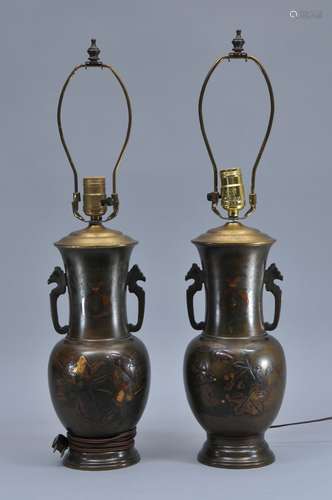 Pair of mixed metal vases. Japan. Meiji period. Japan. (1868-1912). Phoenix handles. Decoration of birds and pomegranates. 12