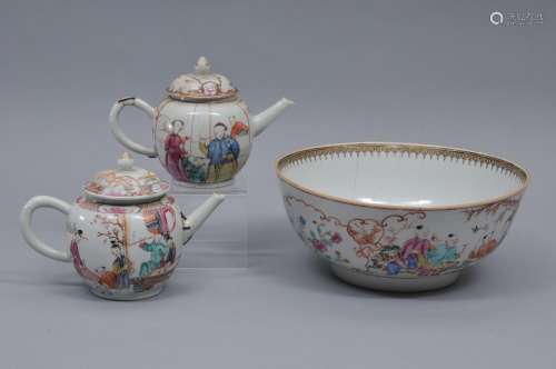 Lot of porcelains. China. 18th century. Export ware. To include: A bowl and two teapots. Famille Rose enamel mandarin decoration. 10-1/4