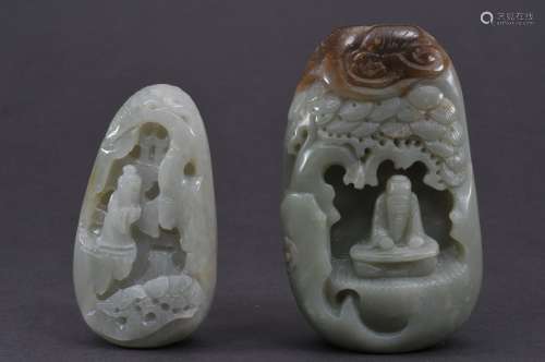 Two jade carvings. China. 20th century. Celadon coloured stone: A snuff bottled carved with a figure in a grotto and a carving of a figure in a landscape. 3-1/2