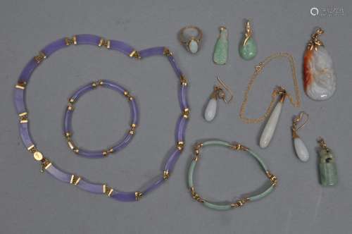 Lot of eleven pieces of assorted jewelry. To include: seven pendants, two bracelets, a necklace and an opal ring.