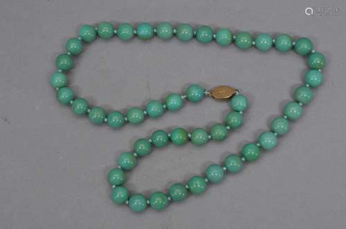 Set of turquoise beads. Even colour.