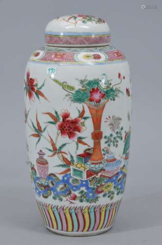 Porcelain covered jar. China. 19th century. Oviform shape. Famille Rose decoration of 