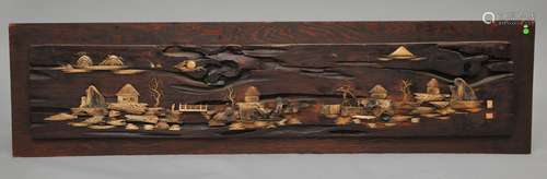 Decorative panel. Japan. 19th century. Carved wood inlaid with bone. Scene of a village in a landscape. 77