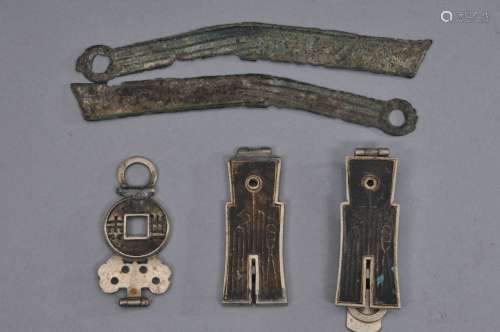 Five ancient coins. China. Three with paktong mountings together with two knife coins. Longest- 5-1/2
