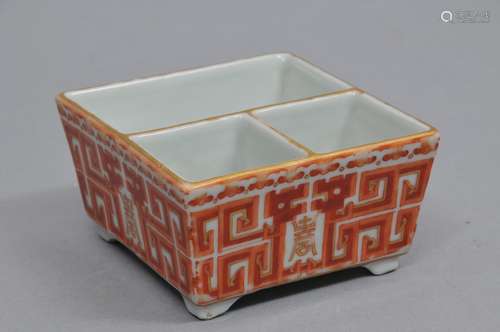 Porcelain dish. China. Hsien Feng mark and possibly of the period. Square form with a three compartmental interior. Iron red decoration of archaic dragons with gilt. 3-1/2