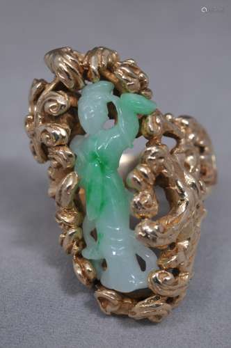 Jade ring. Figure of a woman in apple green jade in a heavy 14KT setting.