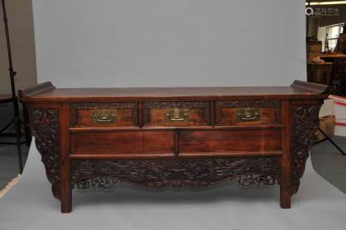 Hardwood altar cabinet. China. 19th century. Three drawers. Surface carved with dragon. 84