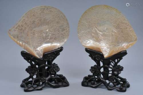 Pair of carved pearl shells. China. 19th century. Decoration of figures in a palace setting. 7