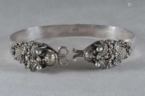 Silver dragon bracelet. China. Early 20th century.