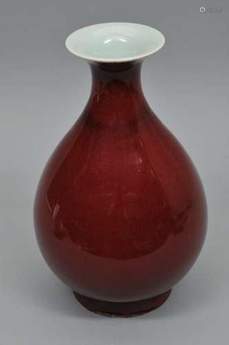 Oxblood vase. China. 19th century or earlier. Yu HU Chun form. Deep red glaze. Ch'ien Lung mark. Spider crack to the foot and chips to the foot rim. 12