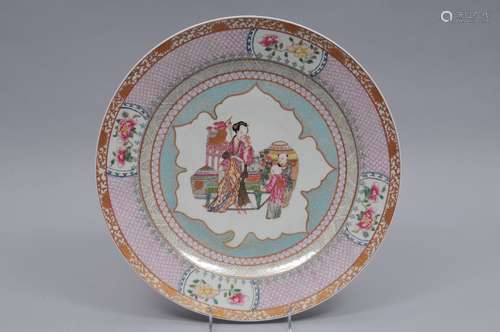 Porcelain plate. Chinese Export style. Late 20th century. Famille Rose decoration of woman and children with brocade patterns. 14-1/4