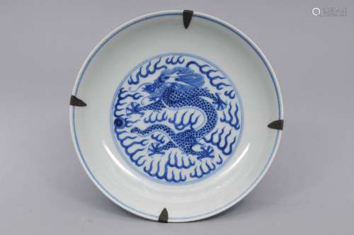 Porcelain bowl. China. Kuang Hsu mark and period. (1875-1908). Underglaze blue decoration of dragons, celestial pearls and clouds. 8