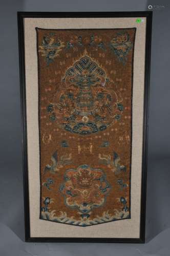 Embroidered panel. China. 19th century. Scene of dragons, pavilions and phoenixes on orange ground. 39-1/2