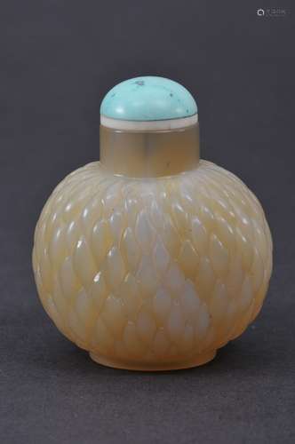 Jade snuff bottle. China. 19th century. Yellow white jade carved in basketry pattern. Very well hollowed. 1-3/4