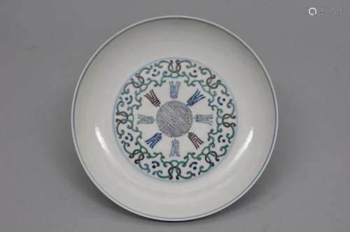 Porcelain dish. China. 20th century. Tou Tsai decoration of stylized shou characters. Yung Cheng mark. 8-1/2