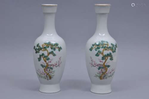 Pair of porcelain vases. China. 20th century. Famille Rose decoration of The Immortals. 12