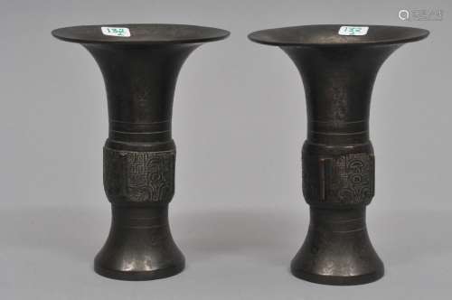 Pair of bronze vases. China. 19th century. Ku beakers with Tao Tieh masks. 4
