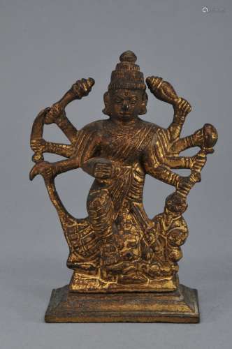 Gilt bronze. India. 19th century. Image of the Goddess Durga with eight arms. Holding various attributes. 4