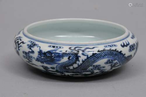 Porcelain dish. China. 19th century. Shallow bowl form. Decoration of dragons, celestial pearls and clouds. 6