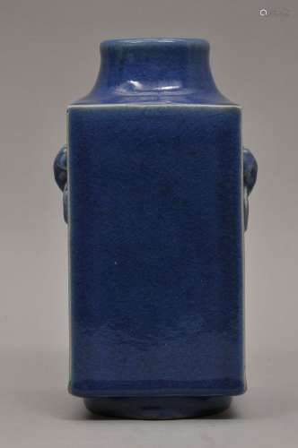 Porcelain vase. China. 19th century. Tsung form with lion mask handles. Dark blue glaze. 10