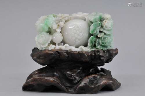 Jade carving. China. 20th century. Lavender greystone with apple and bright green markings. Carving of pomegranates and flowers. 4-1/2