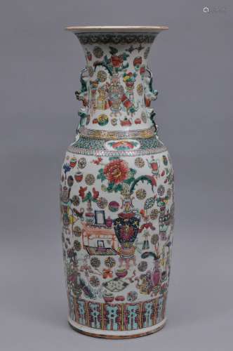 Large porcelain vase. China. 19th century. Famille Rose decorated with antiquties decoration. Crack. 24