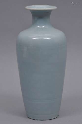 Porcelain vase. China. 19th century. Claire de lune glaze. An Hua decoration of flowers. K'ang Hsi six character regular script mark on the base. 9-1/2
