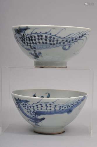 Pair of porcelain bowls. Korea. 19th century. Underglaze blue decoration of dragons. 6-1/2