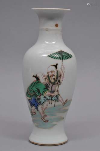 Porcelain vase. China. 19th century. Baluster form. Famille verte decoration of two men with a parasol. K'ang Hsi mark on the base. 9-1/2