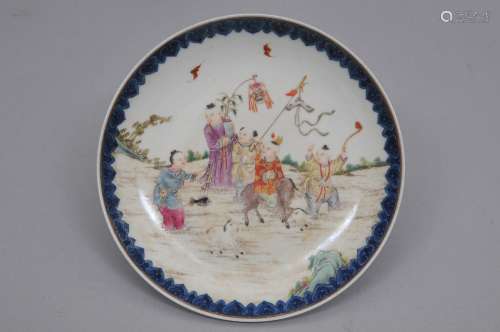 Porcelain dish. China. 20th century. Famille Rose decoration of children playing. Borders of Ju-i in underglaze blue. Kuang Hsu mark. 8