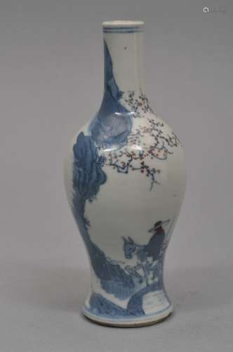 Porcelain vase. China. 19th century. Bottle form. Underglaze blue and red decoration of a scholar and attendant in an early spring landscape. 5-1/2