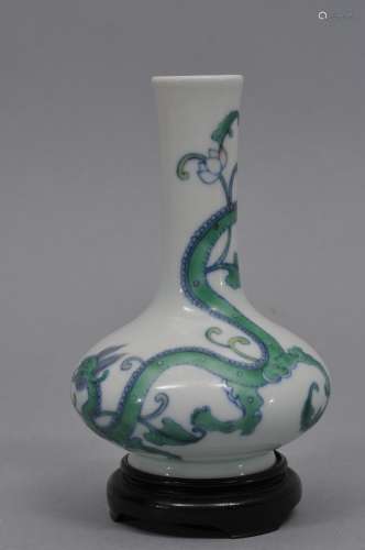 Porcelain vase. China. Yung Ching mark and possibly of the period. Tou Tsai decoration of a chih lung with a lotus flower. 5