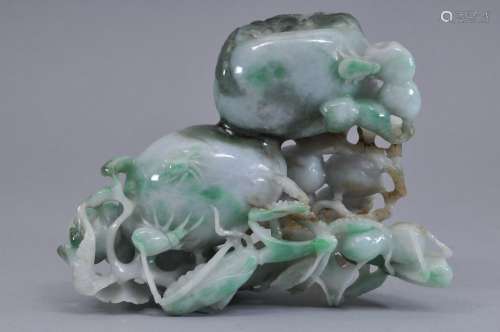 Jade carving. China. 20th century. Lavender greystone carved with bright apple green markings. Study of fruit and insects. 6