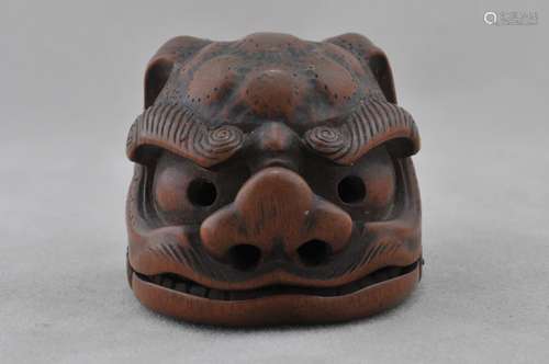 Carved wooden Netsuke. Japan. 19th century. Shishi mask